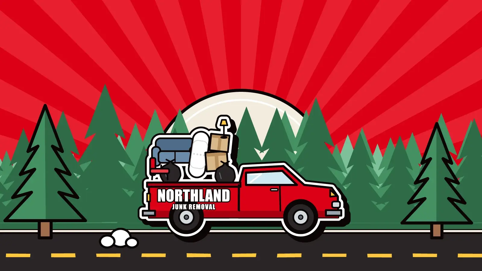 Northland Junk pickup truck loaded with a couch, boxes and trash bags driving through a Minnesota pine forest